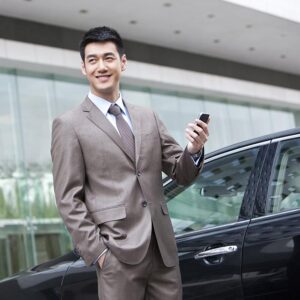 young-businessman-and-cellphone-2022-03-29-08-21-12-utc.jpg